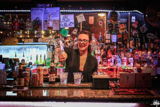 This is a picture of a bartender making cocktails.